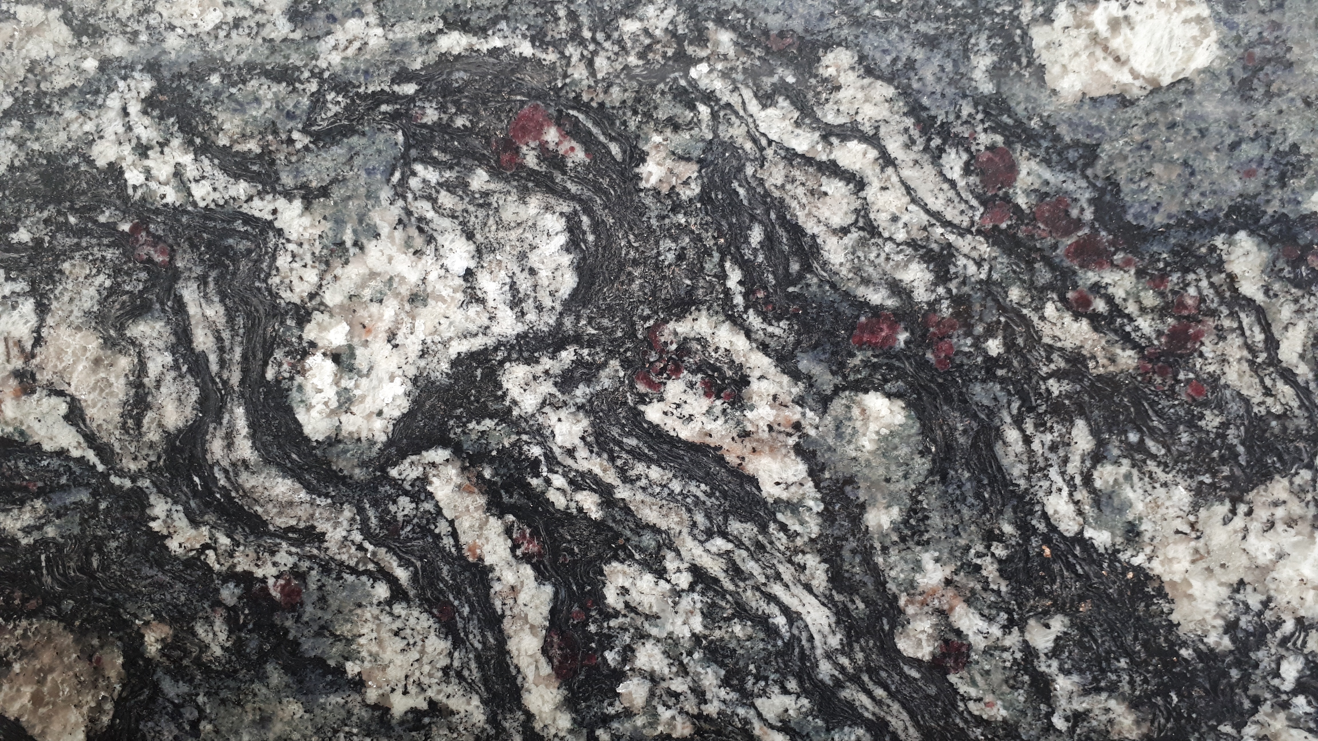 Tranche de GRANIT TITANIUM AZUL POLI finition Poli