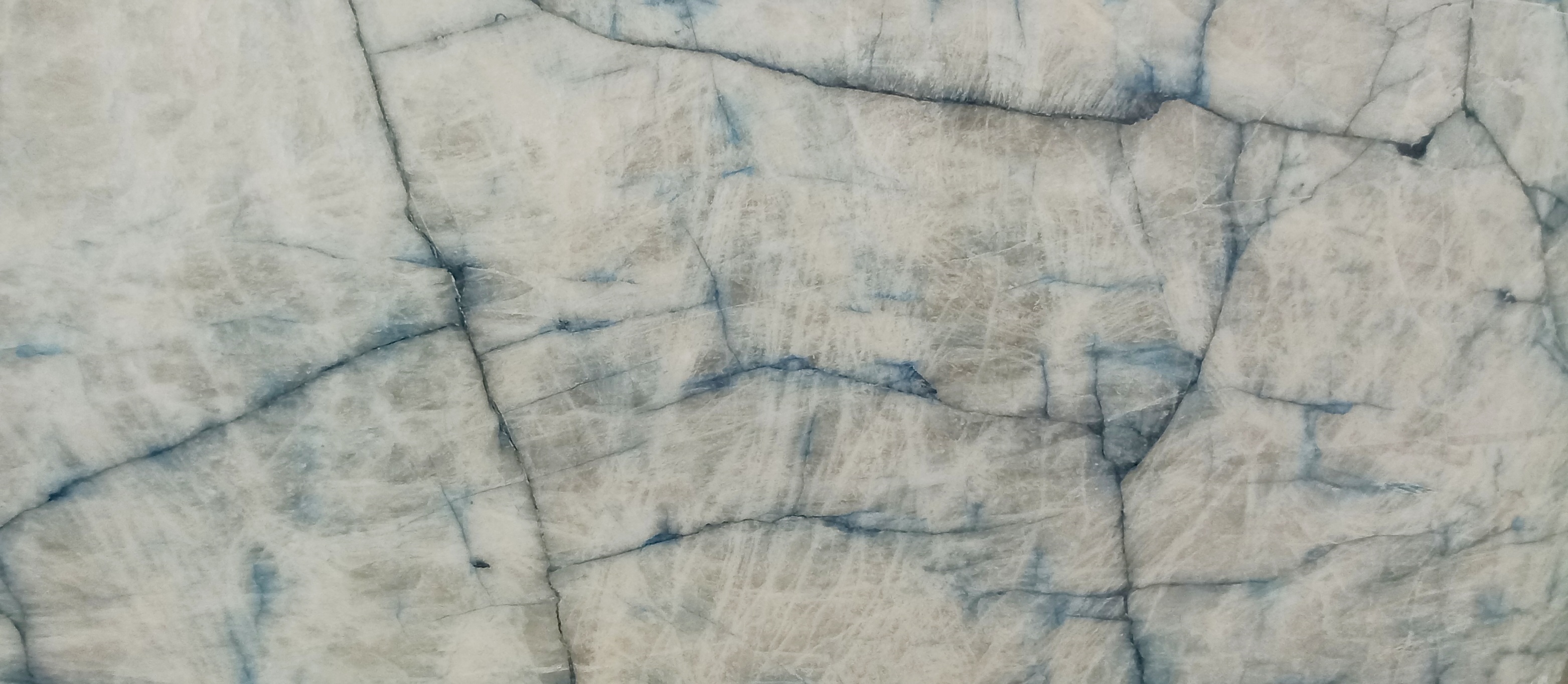 Tranche de QUARTZITE CRISTALLO BLUE EXTRA POLI finition Poli